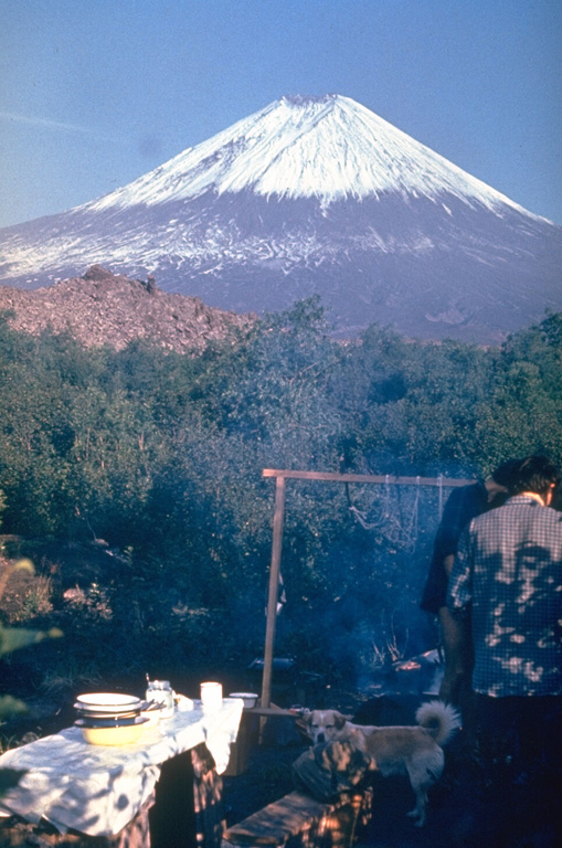 Klyuchevskoy rises above a volcanological field camp on the SE flank. Numerous flank vents have formed on its flanks, including one that produced the Apakhonchich lava flow near this location in 1946. Photo by Yuri Doubik, 1982 (Institute of Volcanology, Petropavlovsk).