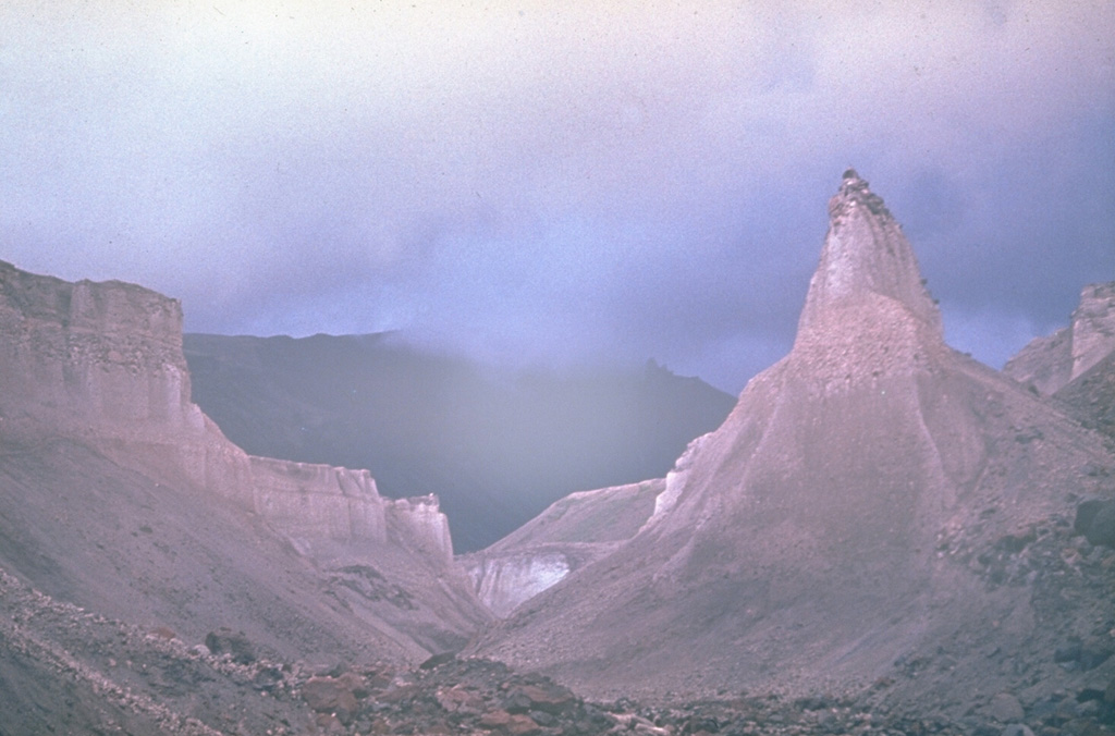 Following the 1964 eruption and debris avalanche, erosional canyons formed in the pyroclastic flow deposits that overlie debris avalanche deposits. The pyroclastic flows were produced during the explosive Plinian phase that followed catastrophic flank collapse.  Photo by Yuri Doubik (Institute of Volcanology, Petropavlovsk).