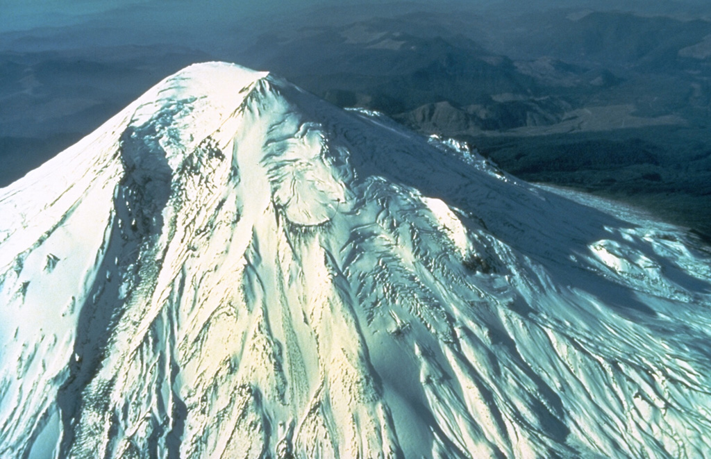 Prior to 1980 Mount St. Helens was a more symmetrical cone that was known as the Fuji of America. Much of the visible edifice formed during eruptions over the past 2,200 years. It is the most frequently active of the Cascade volcanoes and has repeatedly produced large eruptions that deposited ash and pumice over long distances. Pacific Northwest tribes and early settlers observed frequent eruptions during the first half of the 19th century. Photo by U.S. Geological Survey, 1980.