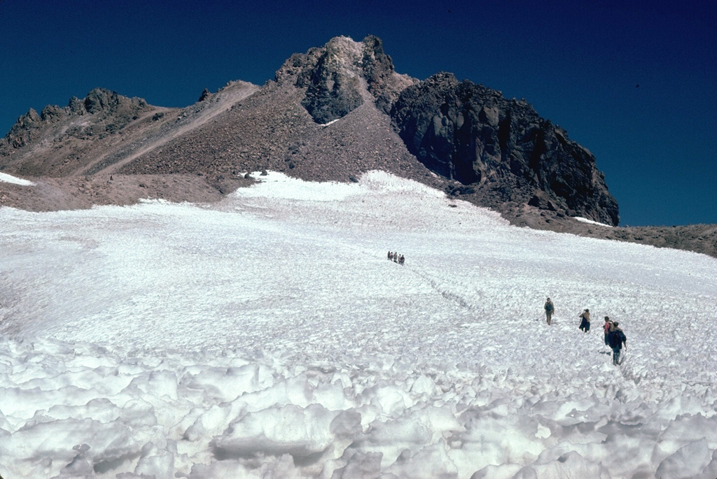 Hotlum cone forms the current Shasta summit and was constructed during the early Holocene. Photo by Lee Siebert, 1981 (Smithsonian Institution).