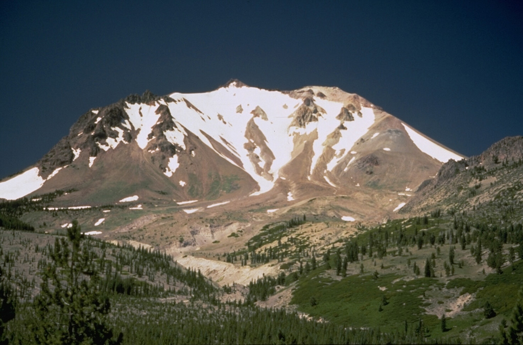 The sparsely vegetated Devastated Zone on the NE flank of Lassen Peak was swept by a pyroclastic surge on May 22, 1915, during the paroxysmal phase of the 1914-1917 eruption.  The pyroclastic surge destroyed forests, and was accompanied by mudflows that traveled down Lost Creek and Hat Creek valleys. Photo by Lyn Topinka, 1984 (U.S. Geological Survey).