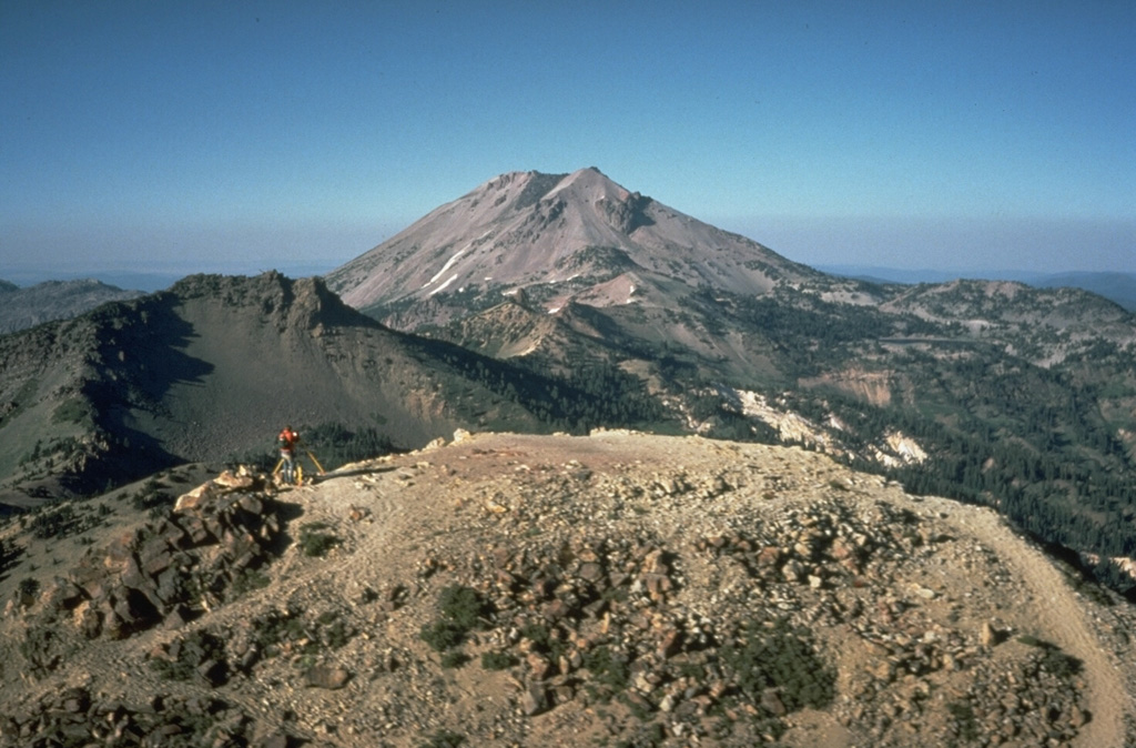 Lassen Peak, seen from Brokeoff volcano to the SW, is one of a series of dacitic lava domes erupted during the past 25,000 years along the northern edge of a caldera on the northern flank of Brokeoff volcano.  Lassen Peak is the largest and most recently active of these domes. Photo by Bill Chadwick, 1981 (U.S. Geological Survey).