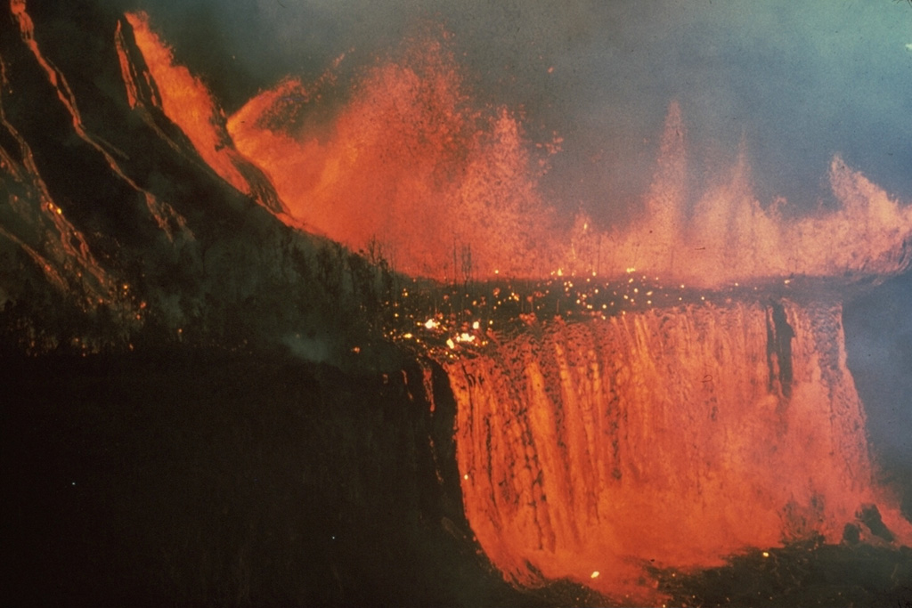 A brief eruption lasting five days in February 1969 took place along a fissure system between Alae and Nāpau craters on Kilauea's East Rift Zone. Lava fountains produced flows that cascaded into Makaopuhi and Nāpau craters. Lava flows buried 5 km of the Chain of Craters Road. Photo by Don Swanson, 1969 (U.S. Geological Survey).