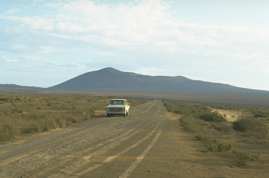 Volcán Riveroll, seen here from the NE, is the northernmost of the southern group of cones within the San Quintín Volcanic Field. A broad crater is at the summit and opens widely to the NW. A smaller nested crater was constructed within the original crater and is the youngest feature of the volcano. Photo by Jim Luhr, 1990 (Smithsonian Institution).