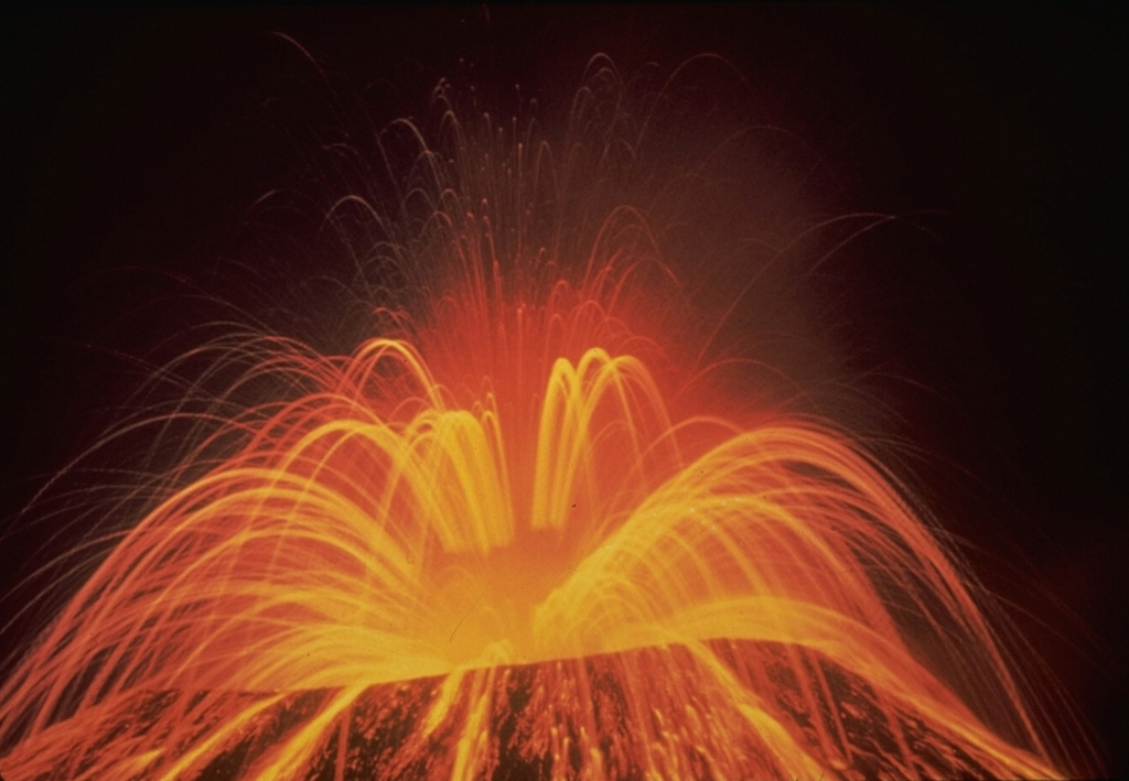 A roughly 15-second time-exposure during the night shows the incandescent trajectories of ejecta from Parícutin on 1 August 1943, near the start of the 1943-52 eruption. Periodic large explosions of bursting lava bubbles in the vent rapidly ejected incandescent lava spatter. Photo by Carl Fries, 1943 (U.S. Geological Survey).