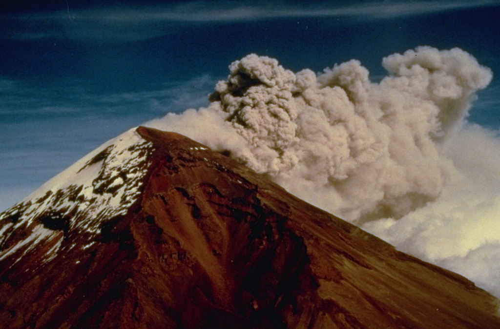 Strong winds disperse an ash plume to the NE from the Popocatépetl summit crater in December 1994. Phreatic explosions that began on 21 December were the first at the volcano in nearly a half century, resulting in ashfall in the city of Puebla, 45 km E. Intermittent ash eruptions lasted until May 1995 and then resumed in March 1996. The explosions ejected a small lake from the crater floor, and three small new craters appeared at the base of the east crater wall. Photo courtesy CENAPRED, Mexico City, 1994.