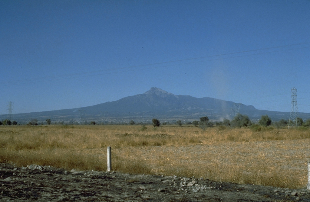 Volcán la Malinche, seen here from the south, derives its name from a Mayan woman who became the wife, aide, and interpreter of the Spanish explorer Cortés. The Spanish mispronounced the woman's name Malintzin as Malinche.  Photo by Steve Nelson, 1987 (Tulane University).