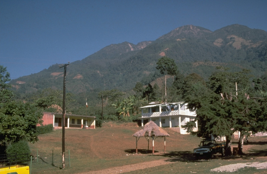 The peak to the left is San Antonio, the youngest of the Tacaná volcanic complex. A major eruption from the upper SW flank about 1,950 years ago produced a block-and-ash flow that traveled about 14 km to the south with associated lahars. The eruption concluded with the extrusion of lava flows and a lava dome. Construction at the pre-Hispanic center of Izapa was halted because of temporary abandonment of the city due to the lahars. Photo by Norm Banks, 1987 (U.S. Geological Survey).