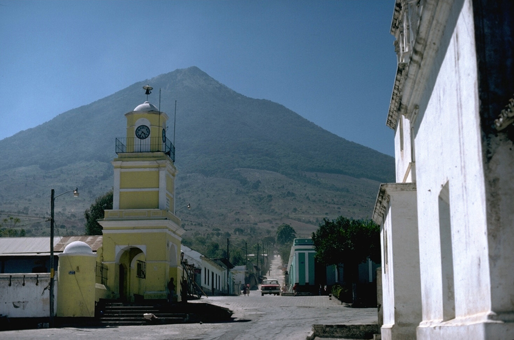 Volcán de Agua seen to the east above the ancient capital city of Ciudad Vieja. A lahar from Agua in 1541 CE destroyed this city, the first capital established by the Spanish. The catastrophe caused the capital city to be relocated to nearby Antigua Guatemala. Photo by Lee Siebert, 1988 (Smithsonian Institution).