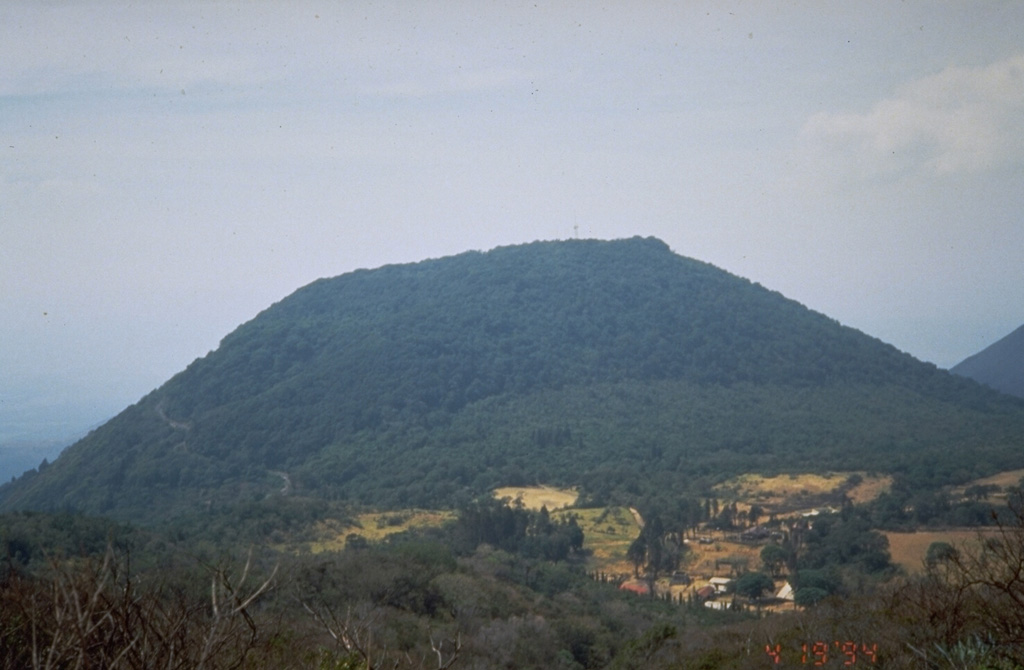 Cerro Verde is seen here from the NW above Hacienda San Blas. Three N-S-trending craters are located at the summit of Cerro Verde, and a fourth is located on the SE flank of the cone. Photo by Kristal Dorion, 1994 (U.S. Geological Survey).