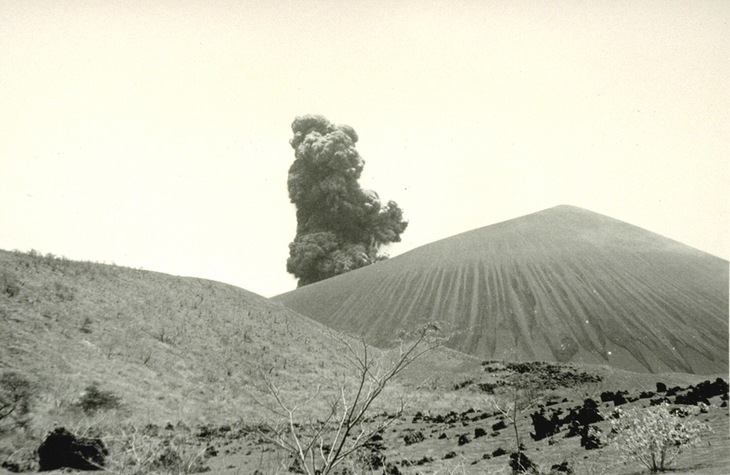Violent strombolian eruptions 9-14 April 1992 produced heavy ashfall that caused extensive damage to buildings and croplands and forced the evacuation of 28,000 people.  This photo shows a small explosive eruption from a vantage point 1 km SE of Cerro Negro during the final day of the 1992 eruption.  Photo by Gerardo Soto, 1992 (Instituto Costarricense de Electricidad).