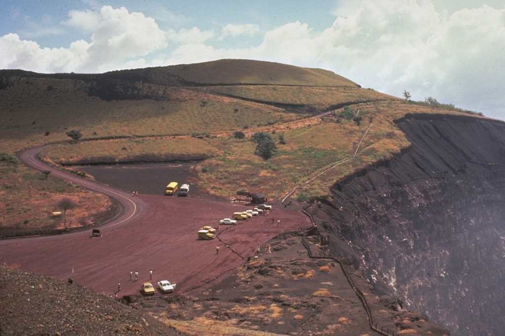 Masaya Volcano National Park provides visitors with the opportunity to observe activity at a frequently active volcano.  This observation point on the NE side of Santiago crater is easily accessible from the capital city of Managua.  The hazards of close access were underscored in April 2001, when a sudden explosion without precursors ejected blocks onto the parking lot and the surrounding area during a visit by cruise ship passengers.  Fortunately, only minor injuries occurred. Photo by Jaime Incer.