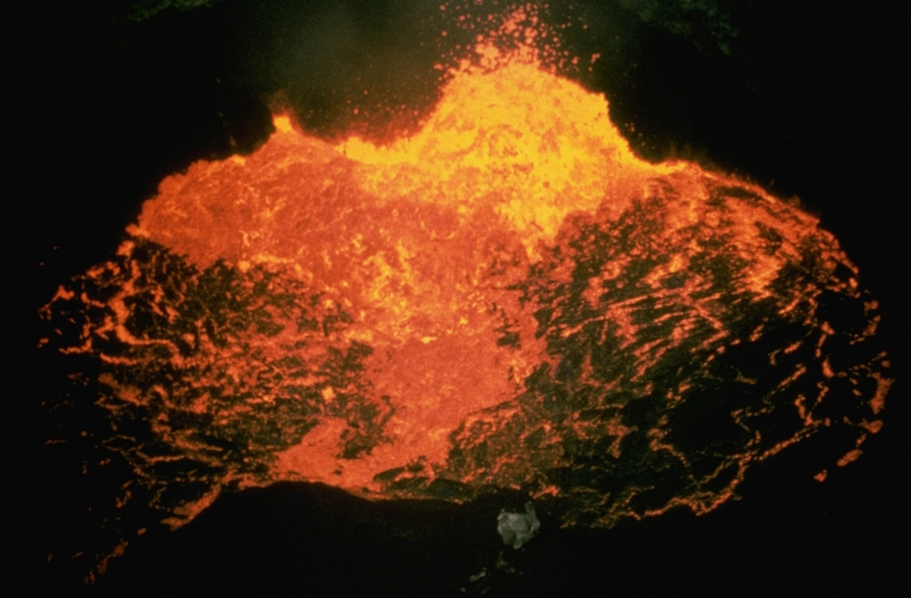 A new lava lake appeared on the floor of Santiago Crater in October 1965, marking the beginning of Masaya's third 20th-century lava-lake cycle.  By 1969 activity was restricted to a small spatter cone in the center of the crater.  Several lava flows erupted on the crater floor between 1965 and 1972.  The spatter cone collapsed in 1972 and lava lake activity was visible until 1979, when activity subsided and was followed by dense gas emissions.  Small ash eruptions took place on single days in 1981, 1982, 1984, and 1985. Photo by Jaime Incer.