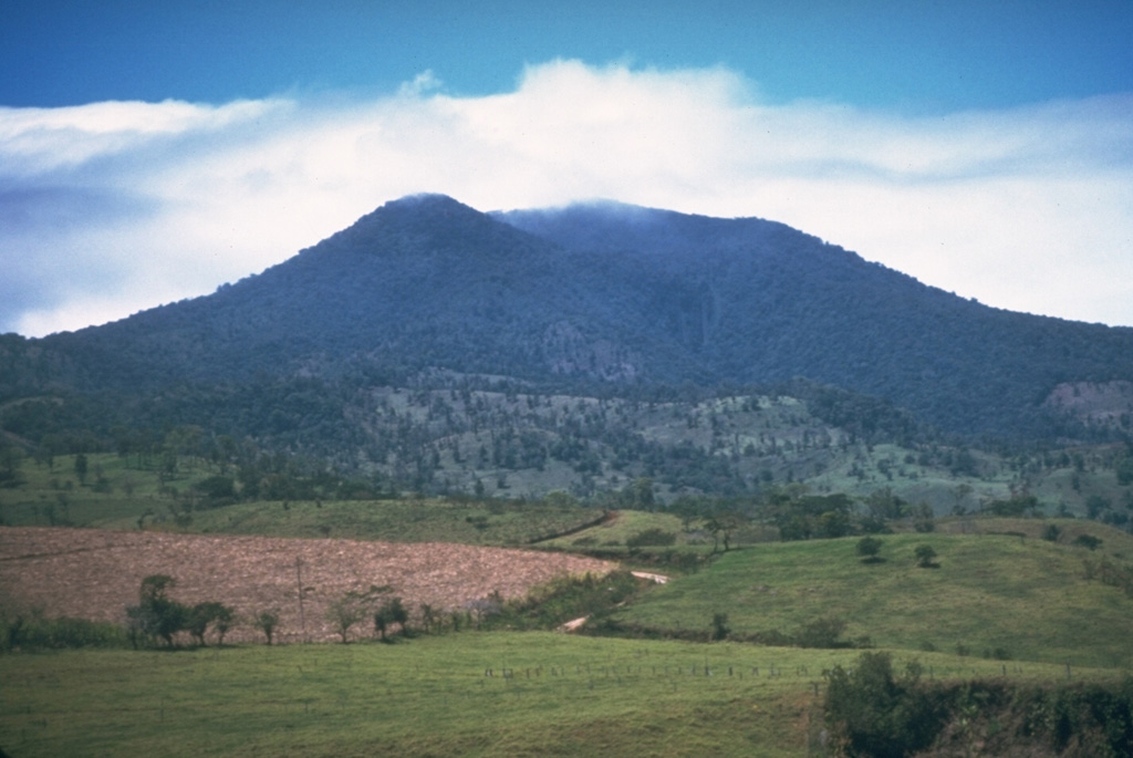 The forested Tenorio volcanic complex contains a group of volcanic cones at the SE end of the Guanacaste Range. Geothermal activity is present on the NE flank. Photo by Cindy Stine, 1989 (U.S. Geological Survey).