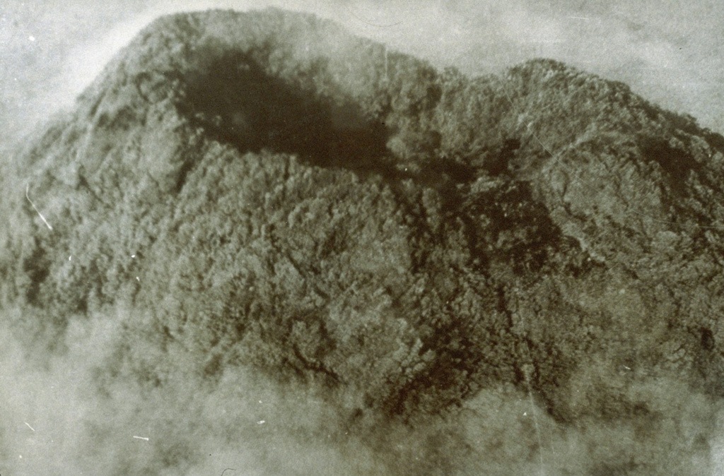 This 1968 view of the vegetated summit crater of Arenal is the only known photo of the summit prior to the major eruption that began that year. The previous significant eruption of Arenal (even larger than in 1968) took place in about 1440 CE, and also produced powerful explosions with pyroclastic flows and lava flows. Photo by Y. Monestel, 1968 (courtesy of Jorge Barquero, OVSICORI-UNA).