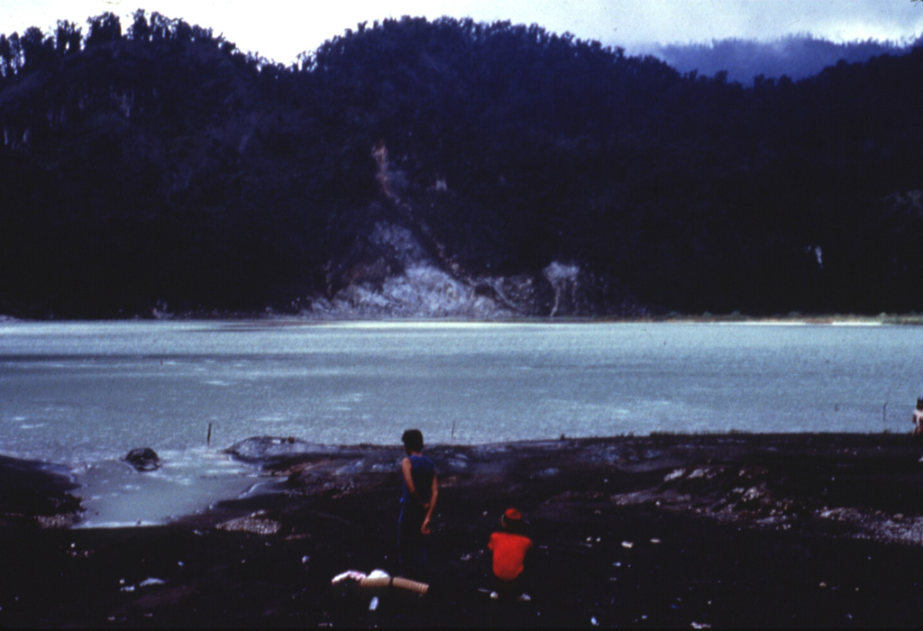 The crater of Gunung Talagabodas, immediately N of the more well-known Galunggung volcano, contains this large sulfur-saturated lake. Fumaroles, mud pots, and a warm spring are found around the 400-500 m wide lake, which also has an elevated temperature. Changes in lake color occurred in 1913 and 1921, and increased solfatara activity was reported in 1927. Anonymous, 1985.