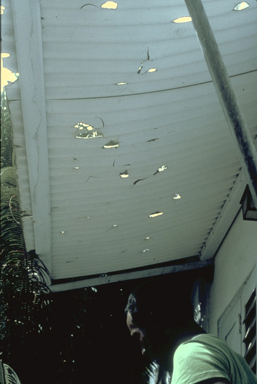 These holes in a wooden awning at the Orange Hill estate, were produced by ballistic ejecta from eruptions of Soufrière volcano.  Orange Hill is located at the coast on the east flank of Soufrière St. Vincent, 7 km from the crater. Photo by Richard Fiske, 1979 (Smithsonian Institution).