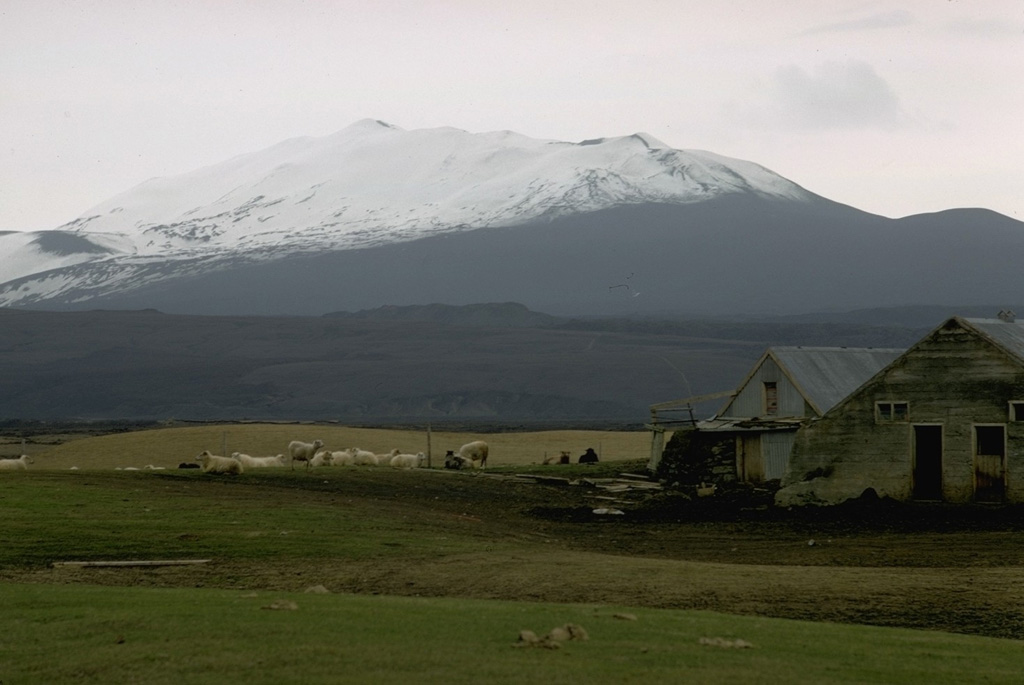 The Hekla edifice, seen here from the east, is elongated due to repeated eruptions along an ENE-WSW fissure that runs across the edifice. Numerous eruptions are recorded throughout the Holocene, both along this summit fissure system and from vents and fissures on the flanks. Photo by Robert Citron, 1970 (Smithsonian Institution; courtesy of William Melson)