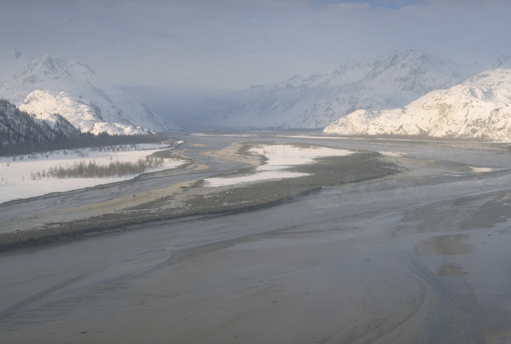 Lahars that formed during the 1989-90 eruptions of Redoubt in Alaska accumulated in the Drift River Valley NE of the volcano. The largest lahars, such as this one from the 15 February 1990 eruption, covered the valley floor nearly wall-to-wall and extended more than 35 km to the Cook Inlet. Photo by Tom Miller, 1990 (Alaska Volcano Observatory, U.S. Geological Survey).