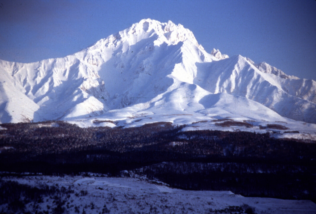 Rishiri forms an island W of the northern tip of Hokkaido. The main edifice ceased erupting during the Pleistocene and extensive erosion has created a rugged summit flanked by radial ridges. Scoria cones and maars on the lower flanks have been active during the late Pleistocene and early Holocene. Photo by Yoshihiro Ishizuka, 1997 (Hokkaido University).