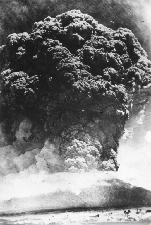 A Plinian ash plume rising above the summit of Komagatake on 17 June 1929, seen here from the town of Mori, NW of the volcano. This was one of the largest eruptions from Komagatake in historical time, producing pumice-rich pyroclastic flows that descended out to 8 km from the crater, and a thick blanket of ash and pumice that caused extensive damage. The maximum reported plume height was 13 km. Activity ceased on 19 June before briefly resuming on 6 September. Photo courtesy of the Komaga-take Disaster Prevention Council, 1929.