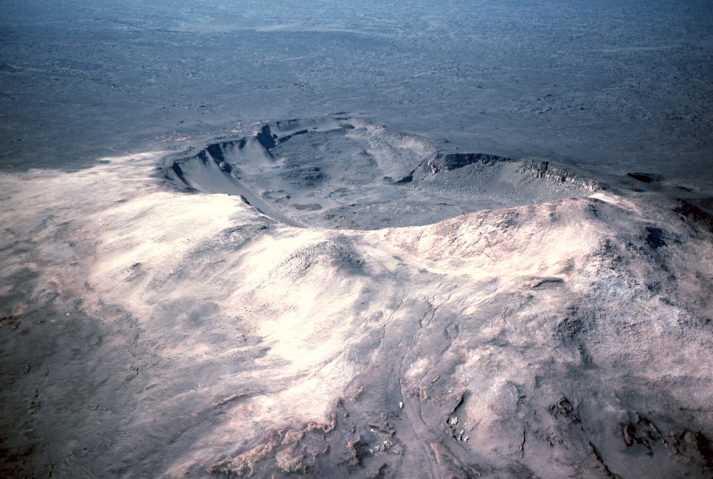 The elongate Ketildyngja shield volcano, the most prominent feature of the Fremrinámur volcanic system, formed about 4,000 years ago and contains a distinct summit crater of about 400 x 800 m. Associated fissure systems extend from just northwest of Askja, across the Ketildyngja shield, and about 130 km to the northern coast of Iceland. Photo by Michael Ryan, 1984 (U.S. Geological Survey).