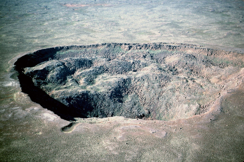 Stóravíti crater, seen here from the SE, is 600 m across and 140 m deep. It is located in the summit area of the Holocene Theistareykjarbunga shield volcano, part of the northernmost subaerial volcanic system along the Eastern Volcanic Zone of Iceland. The youngest dated eruption in this system produced the Theistareykjahraun lava flow about 2,400 years ago. Photo by Michael Ryan, 1984 (U.S. Geological Survey).