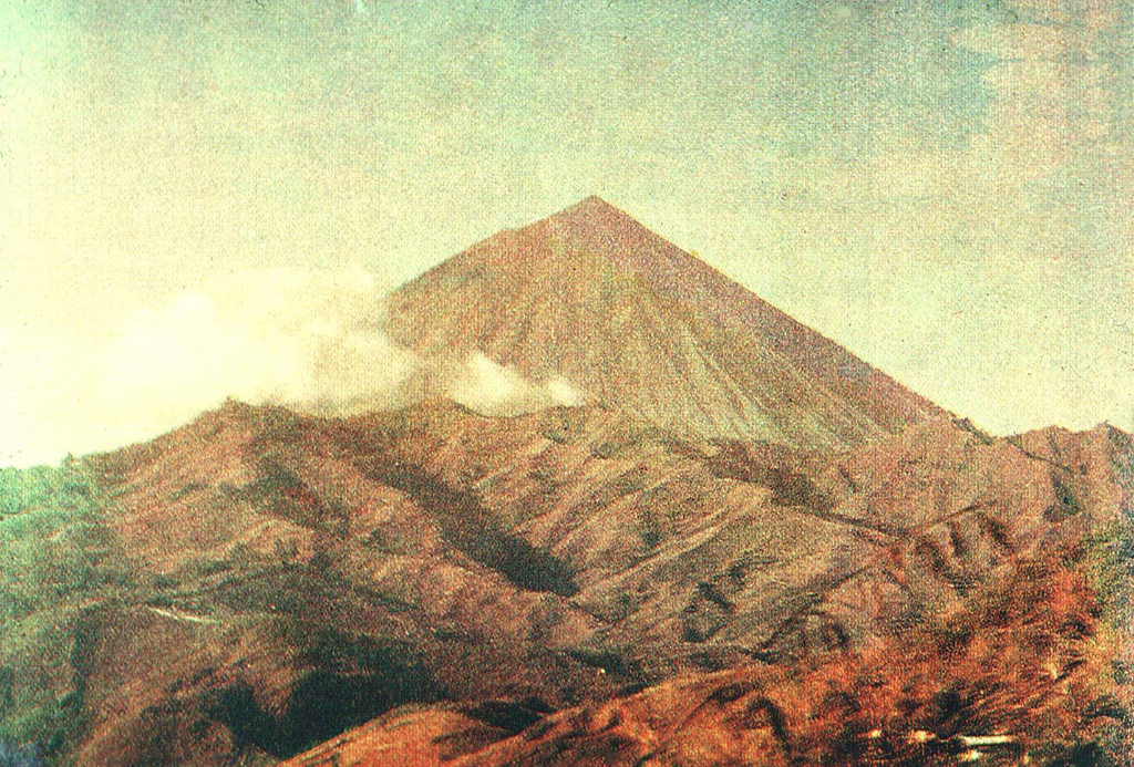 Gunung Inierie, seen here from the SE, is the highest volcano on Flores Island. A plume was noted in June 1911 and is sometimes visible from the crater on the eastern side of the summit. Photo by Tulus, 1990 (Volcanological Survey of Indonesia).