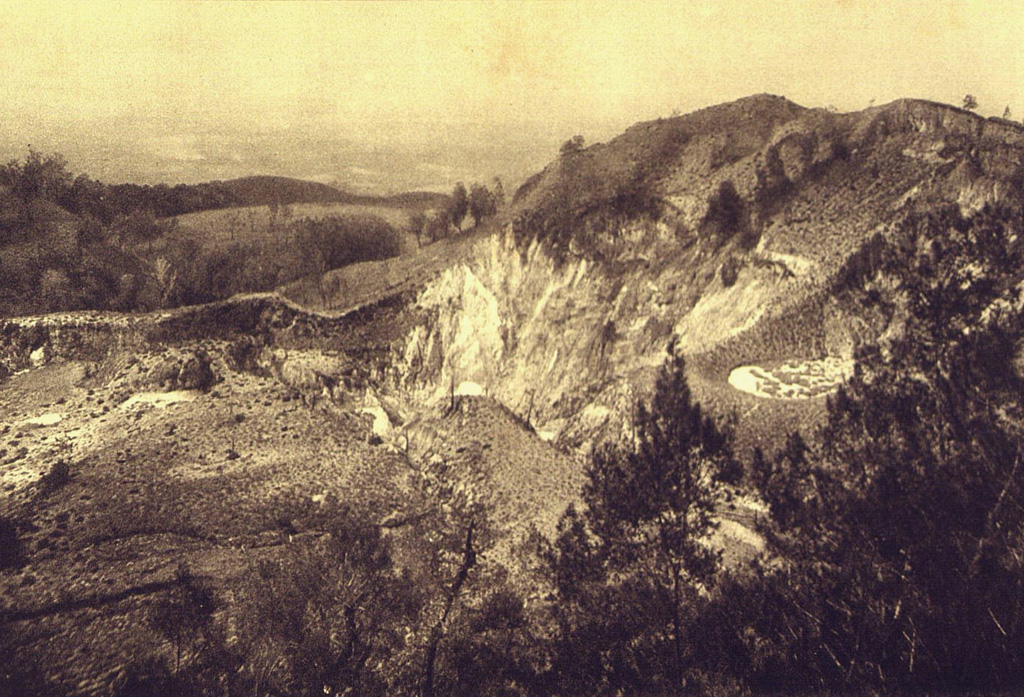 A brief phreatic eruption in November 1905 lasting 5 hours formed this crater at Inielika volcano. The 125-m-wide crater formed on the floor of Wolo Inielika crater, one of many craters along a N-S-trending ridge. Photo by E. Weissenborn (published in Kemmerling 1929, 