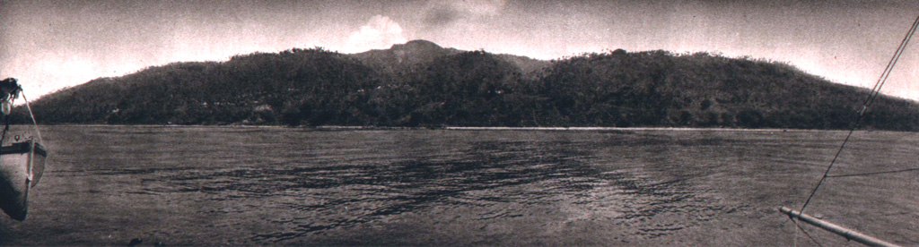 The broad forested 8-km-wide island of Paluweh is seen here from off its NE coast. A rounded lava dome forms the summit of the volcano. Photo published in Kemmerling 1929, 