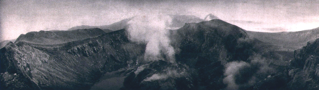 The lava dome emplaced in 1921 on the floor of the summit crater of Lewotobi Perempuan is seen from the NW crater rim in 1925. The 35-m-high dome was formed during the first of two historical eruptions. In contrast, Lewotobi Lakilaki, has erupted frequently since the 19th century. Photo published in Kemmerling 1929, 