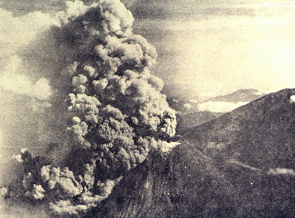 An ash plume rises above the summit and pyroclastic flows (block-and-ash flows) descend the western flank of Merapi in 1961. During 1961, eruptions took place on 13 April, 7-8 May, and 27-28 November. Pyroclastic flows during the 8 May eruption destroyed 10 villages and killed 6 people. Photo by I. Suryo, 1961 (published in Kusumadinata 1979, Data Dasar Gunungapi Indonesia).