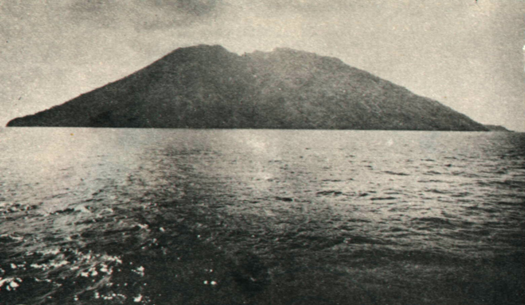 The small 2 x 4 km island of Serua, seen here from off its southern coast, is the emergent summit of a volcano rising 3600 m above the Banda Sea floor.  The 641-m-high truncated central cone is surrounded by an old somma wall.  A lava dome forms the summit of Gunung Serua, which is elongated in a NE-SW direction.  Serua, also known as Legatala, is one of the most active of the Banda Sea volcanoes, with many eruptions recorded since the 17th century.   Photo by Ruska Hadian, 1975 (published in Kusumadinata 1979, 