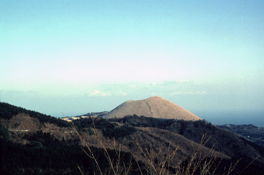 The Omuroyama scoria cone, one of about 70 subaerial volcanoes in the Izu-Tobu volcanic field, formed about 5,000 years ago in the SW part of the field. The cone rises 300 m above the flank in the foreground that was formed by lava flows originating from vents NE and S of the cone. Photo by Yukio Hayakawa (Gunma University).