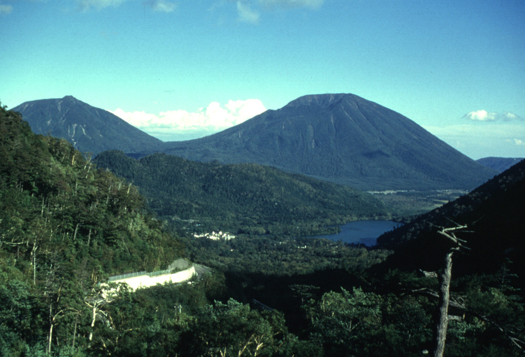 The Nantai cone on the right horizon rises above Yunoko lake and the Senjogahara plain (right center). Lava flows from the early stage of the construction of Nantaisan dammed up the Daiyo River, forming Lake Chuzenji (out of view to the right). A collapse scar is visible on the N (left) side of the volcano. The latest effusive activity of Nantai produced the Osawa lava flow, which traveled from the crater down the N flank. Photo by Yukio Hayakawa (Gunma University).