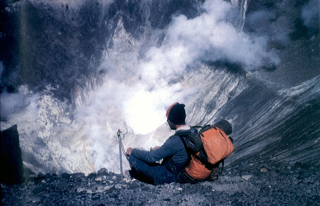 Strong fumarolic activity occurs in the crater where the phreatomagmatic eruptions of the past two decades took place.  A dozen Holocene post-caldera craters and cones are located at the NW end of the 4-km-wide, Pleistocene Nevado Sin Nombre caldera.  Photo by Alejo Contreras (courtesy of Oscar González-Ferrán, University of Chile).