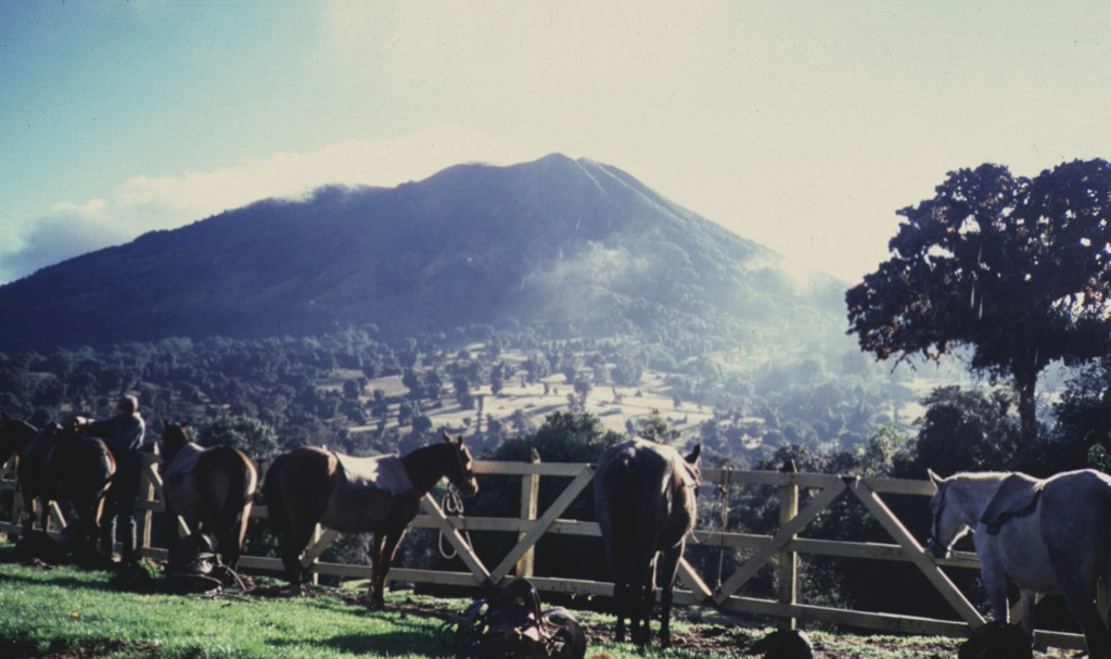 Massive Turrialba volcano, seen here from the west, lies 24 km NW of the city of the same name.  The stratovolcano covers an area of about 500 km2.  The flanks of the volcano display youthful-looking lava flows, and historical eruptions have taken place from summit craters.  Guayabo National Monument, an important archaeological park, lies at the southern base of the volcano and marks the site of human occupation that dates back to 500 BCE.  Photo by Guillermo Alvarado, (Instituto Costarricense de Electricidad).