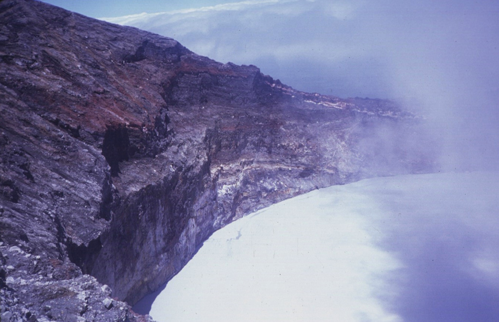The 700-m-wide Cráter Activo contains an acidic lake that is periodically partially ejected by explosive eruptions and therefore varies in depth. Trade winds from the ENE distribute acidic gas plumes to the SW, preventing vegetation growth.  Photo by Guillermo Alvarado (Instituto Costarricense de Electricidad).