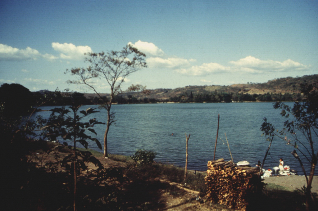 Laguna de Apastepeque is one of several large lake-filled maars in the Apastepeque volcanic field. The 800-m-wide lake is about 50 m deep and is surrounded by ash deposits containing angular blocks of andesite. Photo courtesy of Comisión Ejecutiva Hidroeléctricia del Río Lempa (CEL), 1992.