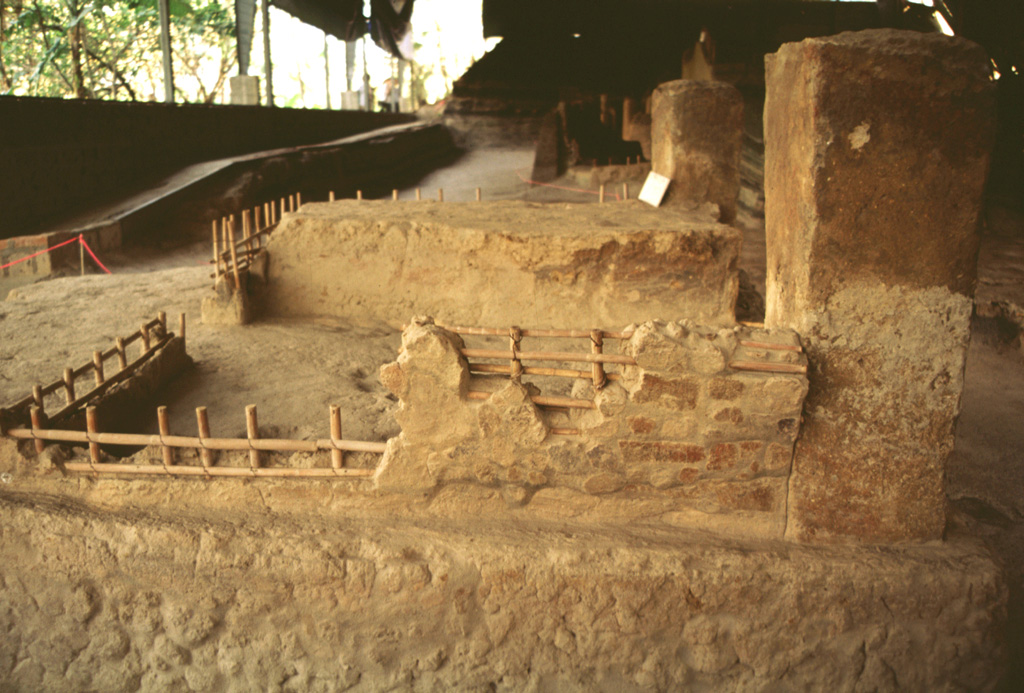 An archeological excavation near the community of Cerén has unearthed several small Protoclassic Mayan homesteads that were buried by an eruption from the nearby Laguna Caldera scoria cone on the northern flank of San Salvador. The eruption occurred suddenly, as seen from the remains of uneaten meals left by occupants who fled their houses. The eruption was radiocarbon dated at about 590 CE. Photo by Rick Wunderman, 1999 (Smithsonian Institution).