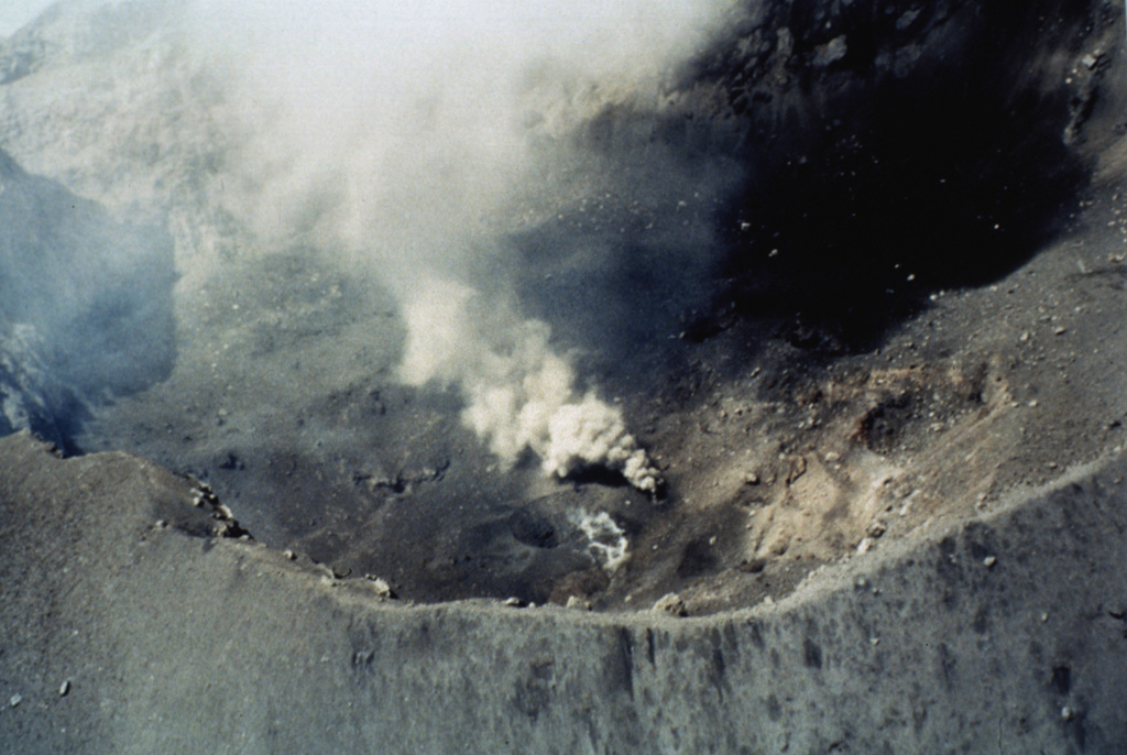 The Popocatépetl summit crater  is seen here from the NW on 16 June 1997. The irregular crater floor has several vents and some active fumaroles. The photo was taken five days after an ash eruption on 11 June that produced a 4-km-high plume and was accompanied by lahars that reached several towns to the east. Another strong explosion on 30 June was followed by lava extrusion on the crater floor. Photo by Roberto Quass, 1997 (Universidad Nacional Autónoma de México).