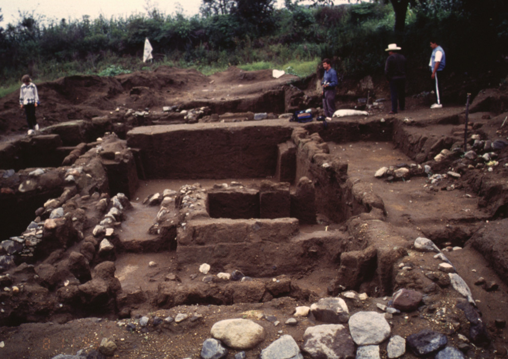 An archaeological excavation on the northern flank of Popocatépetl reveals a village destroyed by a major eruption. The site, known as Tetimpa, was buried by roughly 1 m of tephra around 2,500 years ago. The eruption is known as the Lower Ceramic Plinian Eruption, in reference to the archaeological materials. This small village was constructed on top of an older pyroclastic flow deposit formed during another Plinian eruption about 5,000 years ago. Photo by José Macías, 1995 (Universidad Nacional Autónoma de México).