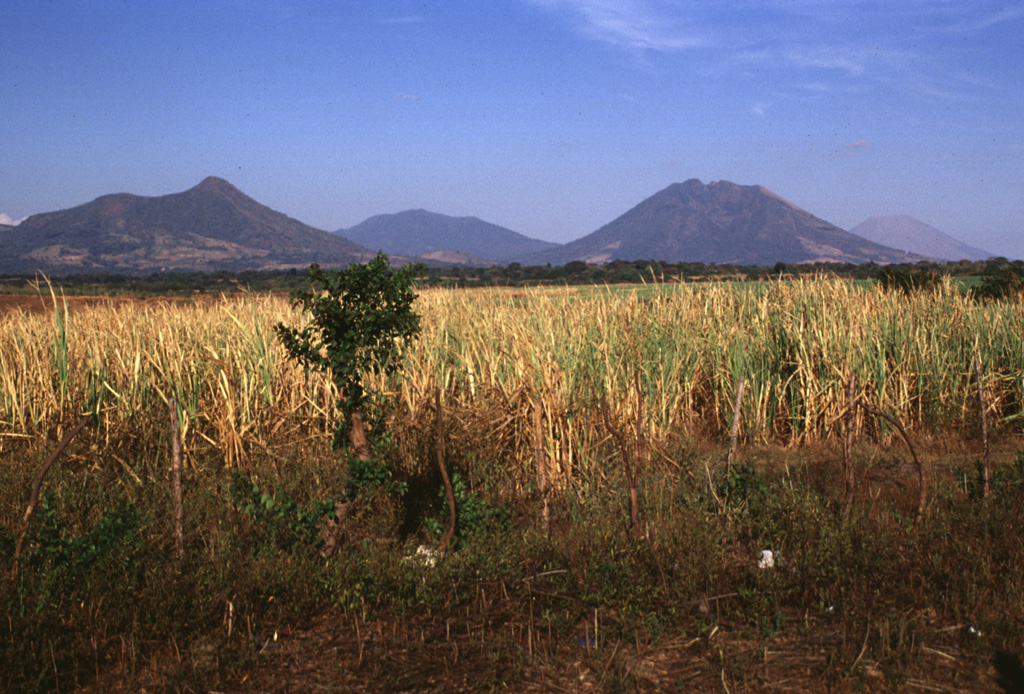 Four volcanoes of the 40-km-long Sierra Tecapa range rise to the NE above the Pacific coastal plain. From left to right are Volcán Taburete, El Tigre, Usulután, and San Miguel, Photo by Lee Siebert, 1999 (Smithsonian Institution).