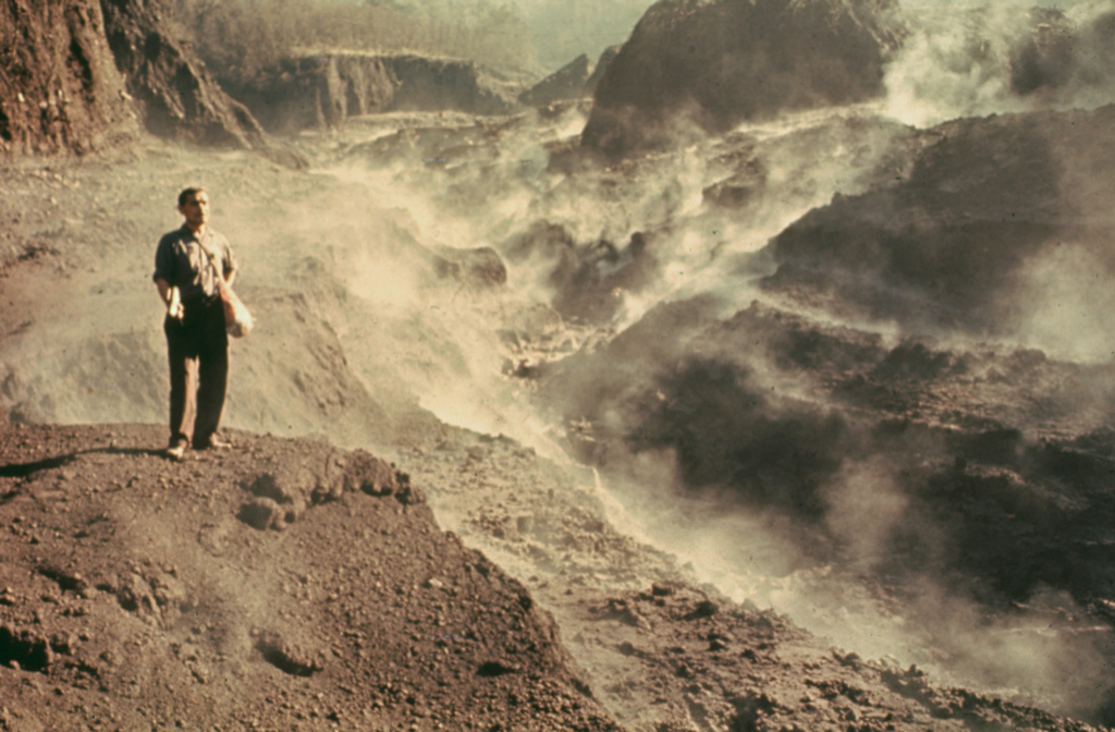 A small lahar travels down the Barranca Honda valley on the eastern side of Fuego during the February-March 1973 eruption. The channel was also affected by pyroclastic flows during the relatively moderate 1972 eruption. Photo by Bill Rose, 1973 (Michigan Technological University).