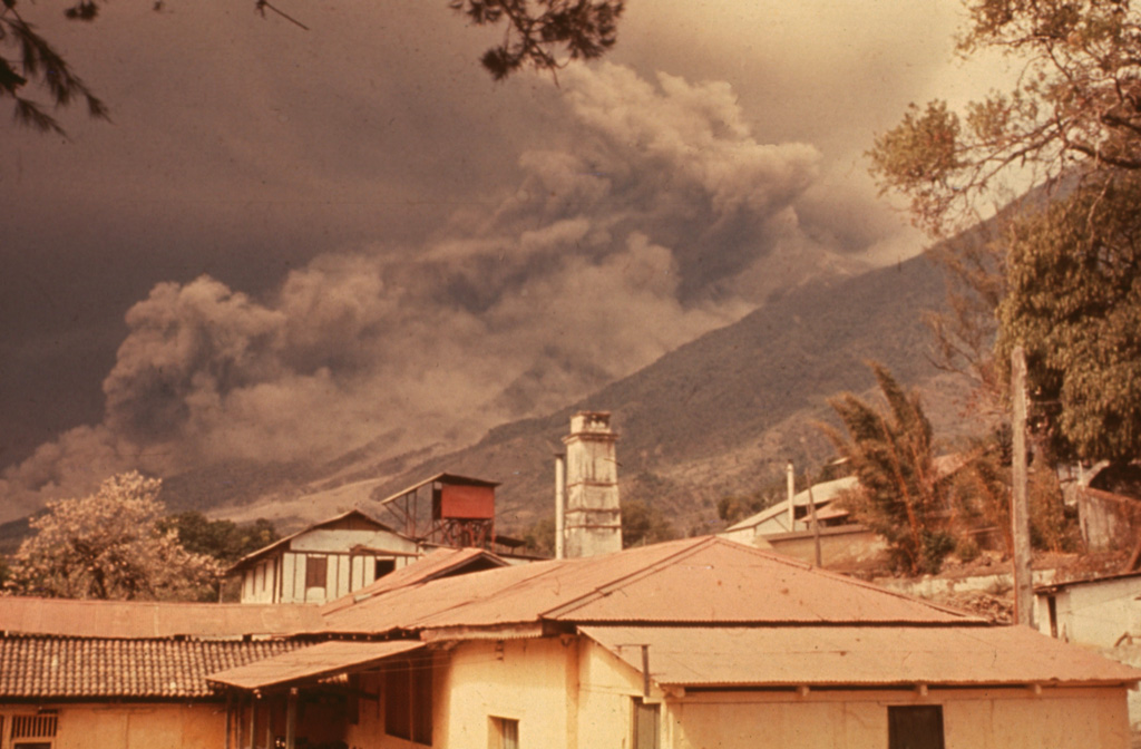 Following strong steam emission at Fuego on 22 February 1973 small eruptions beginning the next day were accompanied by pyroclastic flows down the Barranca Honda on the E flank. Explosive eruptions continued until 3 March and resumed 13 and 22-23 March. Less ash was erupted in 1973 than during the previous eruption in 1971, but pyroclastic flows were more voluminous and traveled farther downslope. This photo was taken from Finca Capetillo, near Alotenango. Photo by Sam Bonis, 1973 (courtesy of Bill Rose, Michigan Technological University).