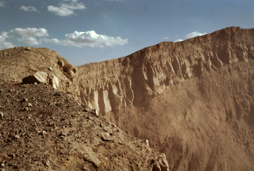 A jointed lava flow underlain and capped by pyroclastic ejecta is exposed in the western crater wall of Telica's NE summit crater, the source of most of the volcano's recent eruptions.  The crater is about 300 m wide and several hundred meters deep. Photo by Bill Rose, 1978 (Michigan Technological University).