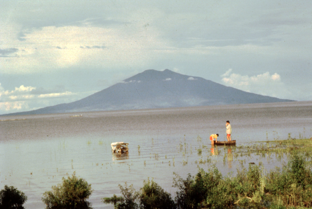 Maderas volcano rises to a height of 1394 m across a roughly 20-km-wide strait from the western shores of Lake Nicaragua.  The volcano, also known as La Madera, is the SE-most of two large stratovolcanoes forming the dumbbell-shaped island of Ometepe.  No historical eruptions are known from Maderas. Photo by Jaime Incer.