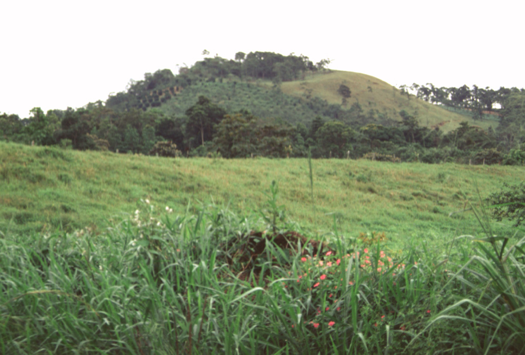 The Aguas Zarcas group of nine basaltic scoria cones is located on the northern flank of the Platanar-Porvenir complex. These cones lie 10-17 km behind the volcanic front of Costa Rica.  Photo by Paul Kimberly, 1998 (Smithsonian Institution).