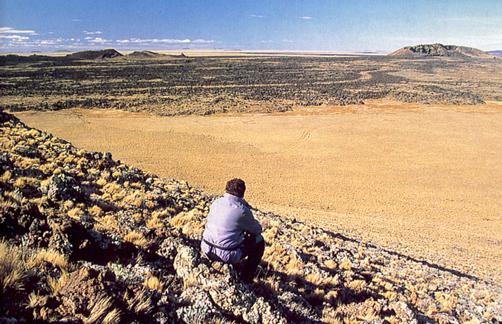 A lava flow of the Pleistocene-to-Holocene Palei-Aike volcanic field is seen here from Cerro del Diablo.  The large volcanic field straddles the Chile/Argentina border north of the Straits of Magellan.  The southernmost of the Patagonian basaltic plateau lavas, Palei-Aike contains lake-filled maars and basaltic scoria and spatter cones with associated fresh-looking lava flows.   Photo by Andres Figueroa Zurita (courtesy of Oscar González-Ferrán, University of Chile).