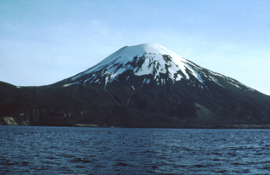 Amukta in the central Aleutians is located along the coast of the 8-km-wide island of the same name. It has had several eruptions since the late 18th century from both summit and flank vents. Photo by U.S. Fish and Wildlife Service, 1972 (courtesy of Alaska Volcano Observatory).